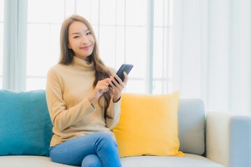 Portrait beautiful young asian woman with smart mobile phone