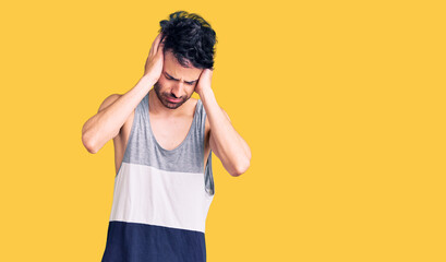 Young hispanic man wearing casual clothes suffering from headache desperate and stressed because pain and migraine. hands on head.