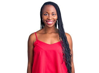 Young african american woman wearing casual clothes with a happy and cool smile on face. lucky person.