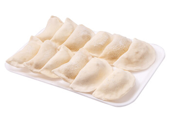 Frozen dumplings in a tray in rows on a white background