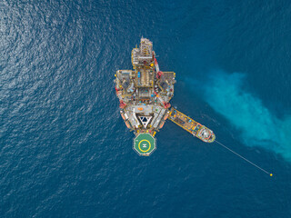 Aerial view from a drone of an offshore jack up rig at the offshore location during day time