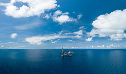 Naklejka premium Panoramic aerial view from a drone of an offshore jack up rig at the offshore location during day time