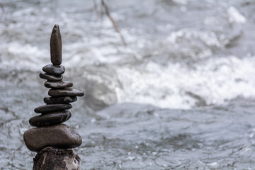 Balancing stones in nature, natural art, meditation and yoga for the body