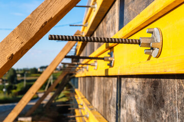 Close-up construction of a retaining wall or counterfort, formwork, reinforced, preparation to pour concrete, construction site. Improvement of the territory. Preventive measures against landslide