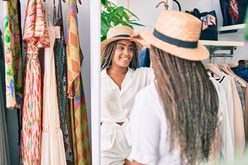 Young african american woman smiling happy at retail shop