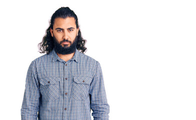 Young arab man wearing casual clothes depressed and worry for distress, crying angry and afraid. sad expression.