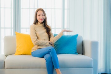 Portrait beautiful young asian woman relax leisure enjoy on sofa