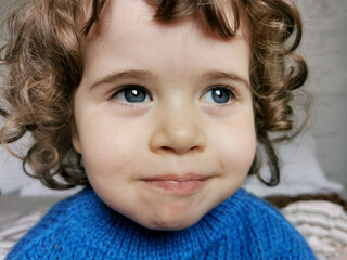 Portrait of a  little girl smiling to the camera