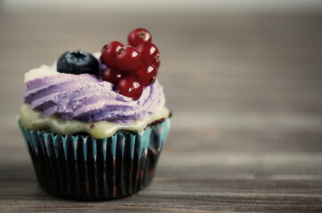 Cupcake with fresh berries, homemade cakes
