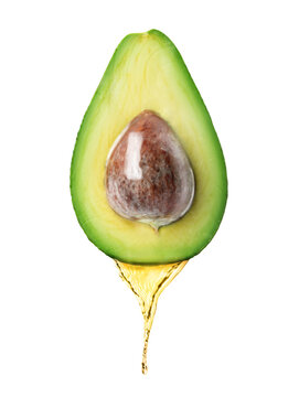 Avocado Oil Dripping From Fresh Fruit On White Background