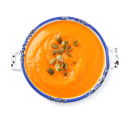 Tasty creamy pumpkin soup in bowl on white background, top view