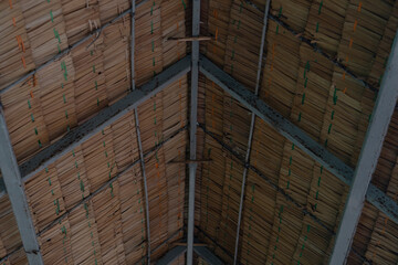 Interior view of the building under the leaf roof from the steel structure.