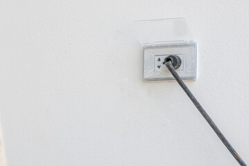 Multiple socket with connected plugs.