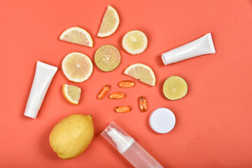 Cosmetic bottle containers with fresh lemon slices, Blank label for branding mock-up, Natural Vitamin C skincare beauty product concept.