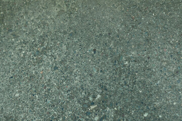 Textured: grey asphalt close - up as background