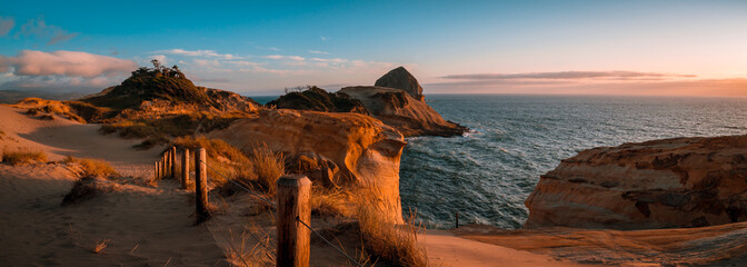 Beautiful sunset panorama of Cape Kiwanda on Oregon Coast © mdurson
