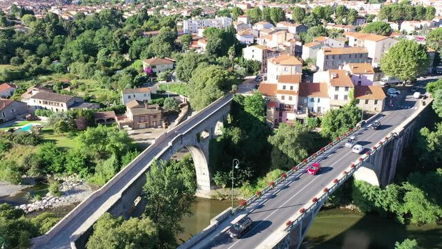 Flight over the city Ceret on summer day. France
