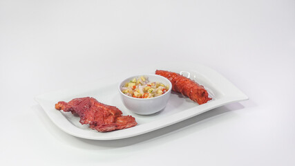 Tacacho con chorizo, cecina y ají de cocona 