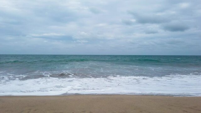 Panning shot in beach to horizon side in Dhanushkodi Beach in Rameshwaram, Pamban in 4K