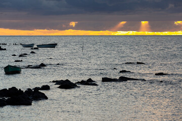 sunset on the beach of Point Aux Sable in the republic of Mauritius.