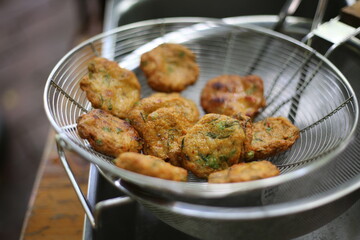 To cook Thai fish cake frying in the pan