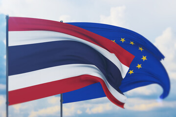 Waving European Union flag and flag of Thailand. Closeup view, 3D illustration.