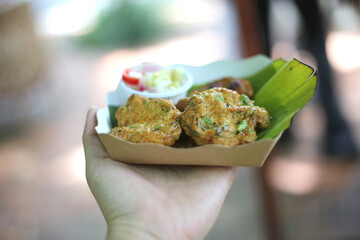 To cook Thai fish cake frying in the pan