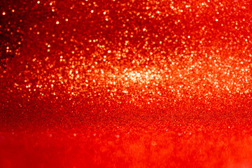 Abstract  red sparkling bokeh background. Top horizontal view copyspace.