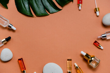 Natural Serums and face oils. Cosmetic hydrating serum in a glass bottle with pipette close up....