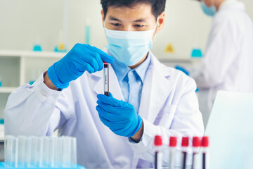 Scientist covid-19 virus chemistry  research experiment biotech antibody sample laboratory...