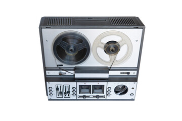 Stereo tape deck recorder player with reels on background.