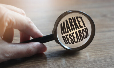 Market research under magnifying glass. Business concept