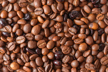 Coffee beans texture high quality background. Roasted coffee beans. Mixture of different kinds of roasted coffee beans background.