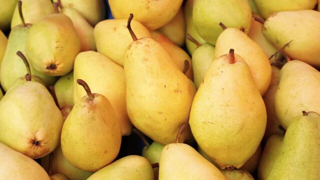 yellow pears in a market