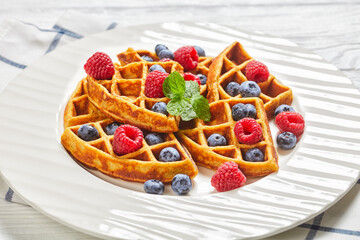 oatmeal banana waffles with berries, top view