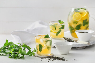 Tasty cold ice tea on table