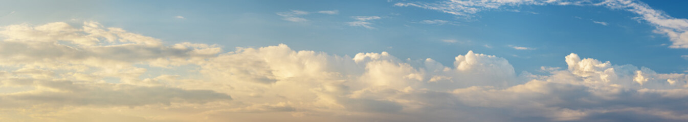 Sky clouds horizontal panorama at mornig sunlight.