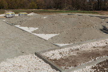Construction site of sand, soil and crushed stone.