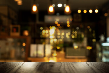 top of black table with blur light in pub or bar party night life background