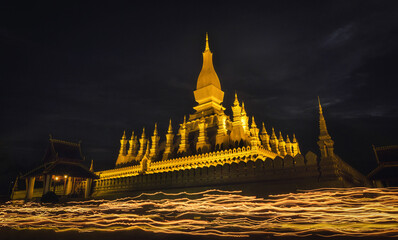 Pha That Luang is a gold-covered large Buddhist stupa in the center of the city of Vientiane, Laos....