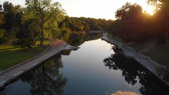 Sunset tour of barton springs pool at sunset during a perfectly calm night. One of the gems of austin