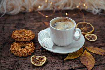  Cup of coffee with meringues, warm cozy photo
