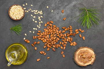 Inshell pine nuts and pine nut kernels. Cedar branch and cedar oil.