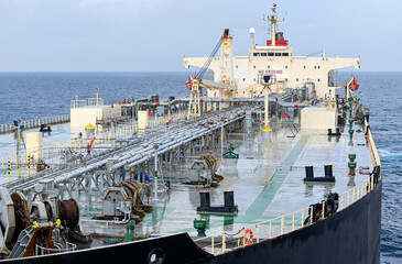 The oil tanker in the high sea after a rain