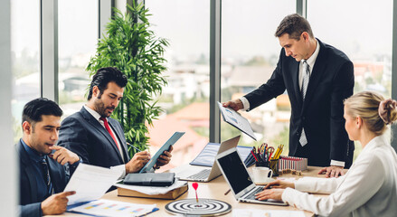 Group of professional business meeting and discussing strategy with new startup project.Creative business people planning and brainstorm with laptop computer in modern office.Teamwork concept