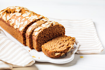 Sliced banana bread, close up, white background.  bread on white board, white background.