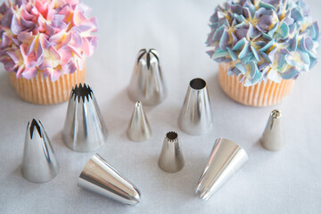 Cupcakes and decorating tools, icing or piping nibs or tips 