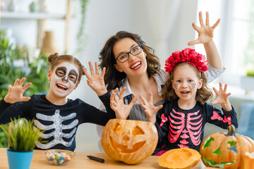 Happy family preparing for Halloween.