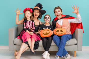 Happy family celebrating Halloween.