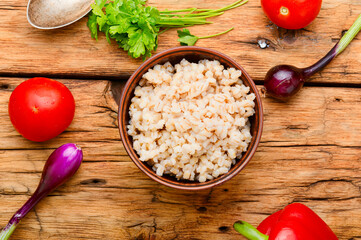Boiled pearl barley on plate